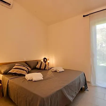 In Costa Rei Just 450 Meters From The Beach, With Air Conditioning And Outdoor Private Area
